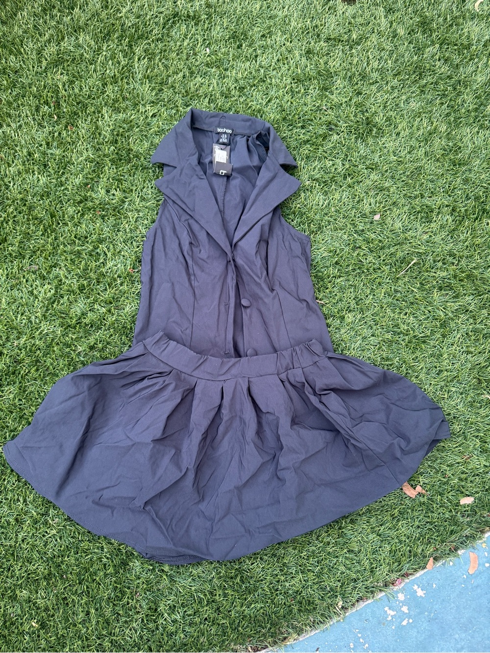 Sleeveless Black Button up top and skirt
